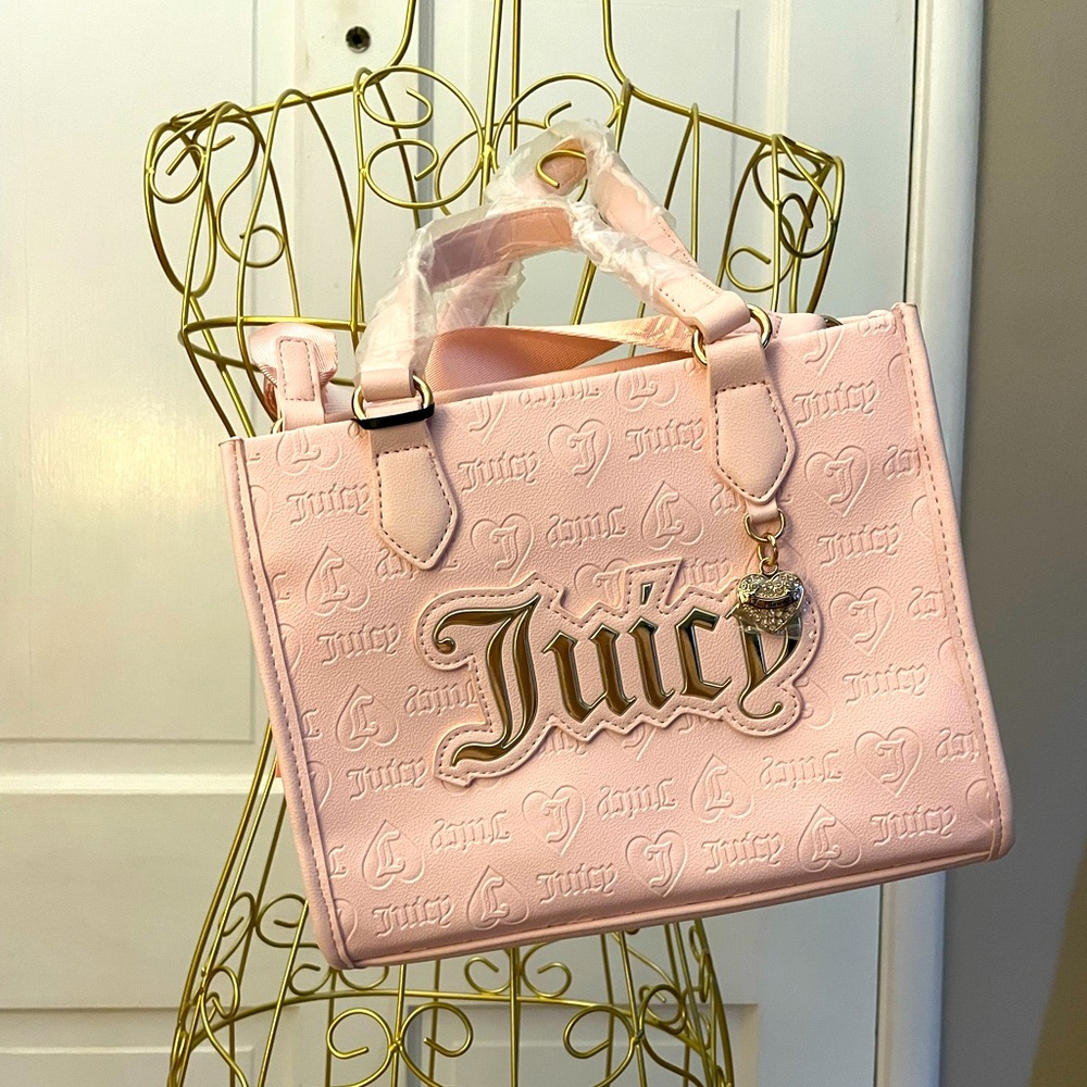 Brand new light pink juicy couture purse. 9 1/2 x 8“ excluding handles.